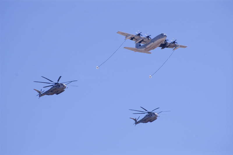 in air helicopter refueling from a herculees plane
