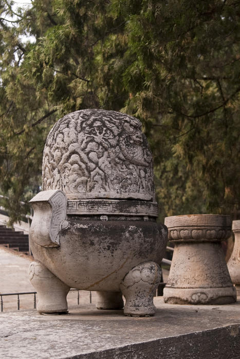 a carved stone earn outside a beijing temple
