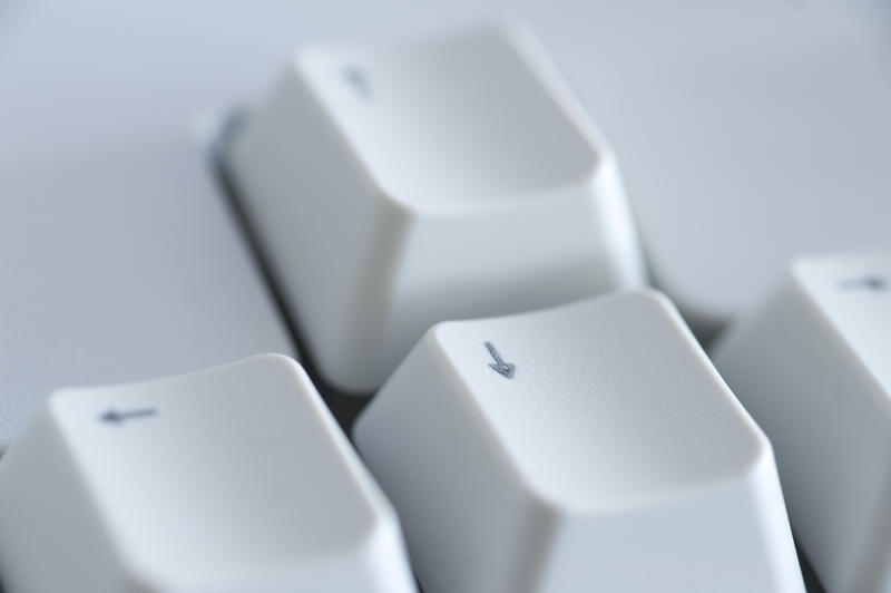 the arrow direction keypad on a computer keyboard