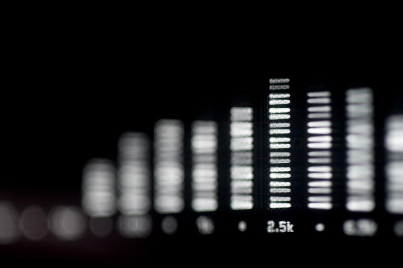 bar graphs on a spectrum analyser display pictured with a narrow depth of field