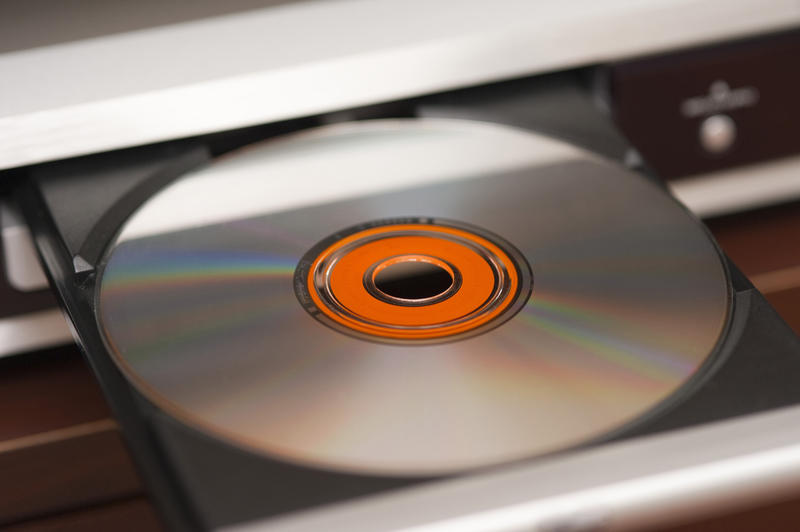an audio CD in a sliding draw pictured with a narrow depth of field