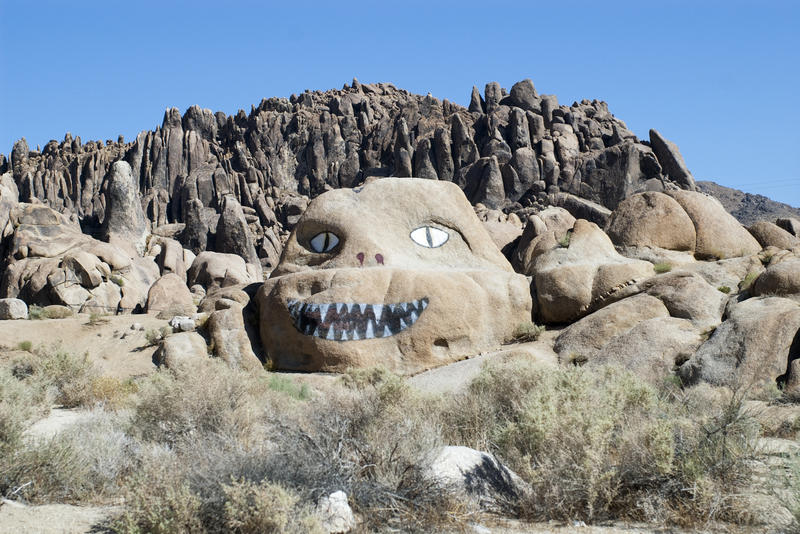 face painted on a rock in the alabama hills,
