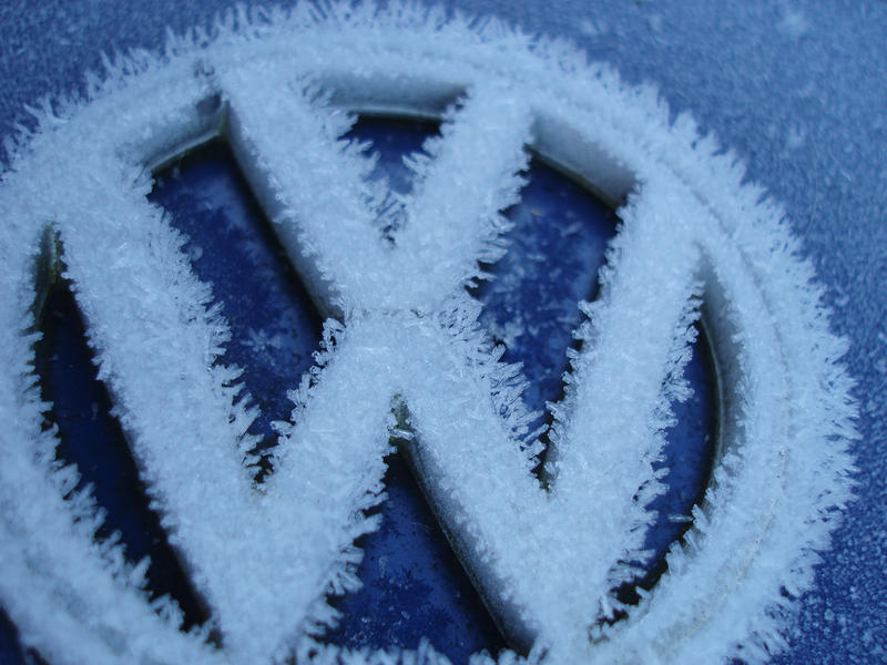 frost crystals growing on the VW badge of a classic car
