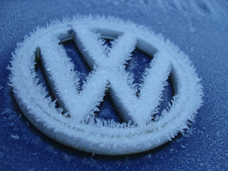 hoar frost growing on the badge of a classic volkswagen