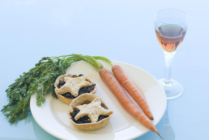 a plate of christmas mince pies for santa and carrots of rudolph