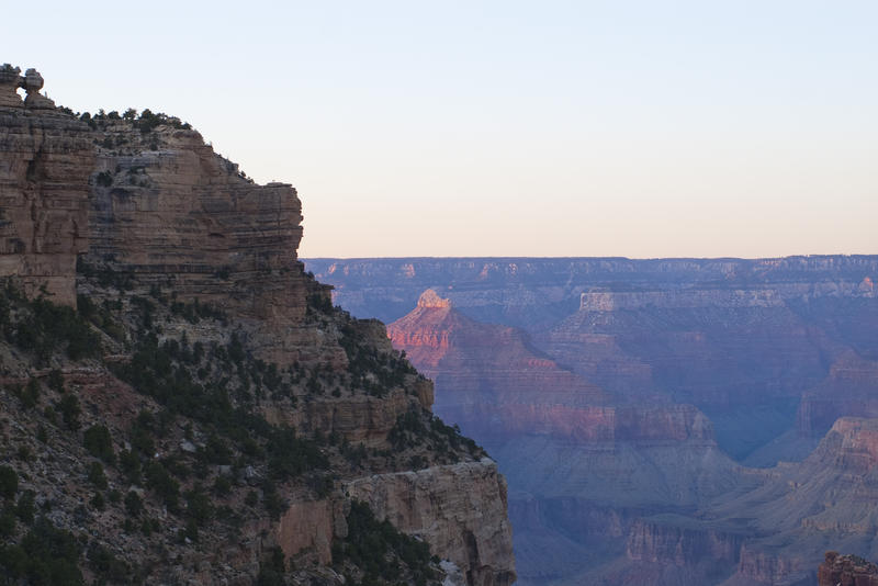 spectacular rock formations on the south rim of the grand canyon, pictured just before sunset