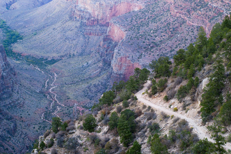 looking down into the grand canyon from footpaths along the steep sides