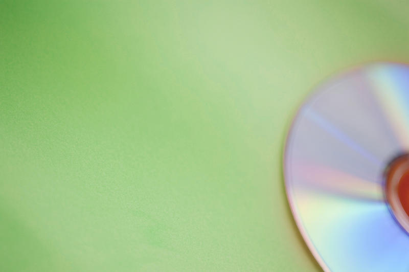 a defocused CD on a green background