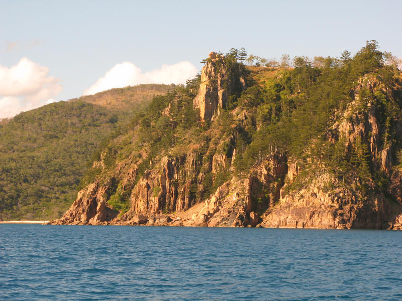 steep cliffs and trees on the north end of hayman island