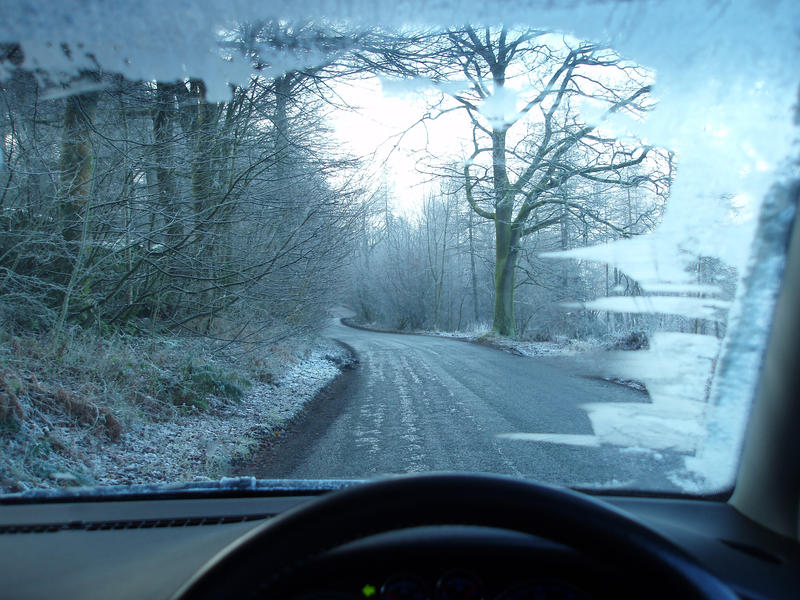 driving a car on icy winter roads