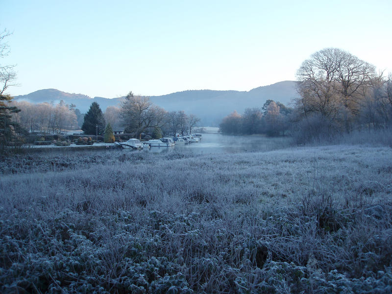 lake side meadow covered in frost on a freezing winters morning