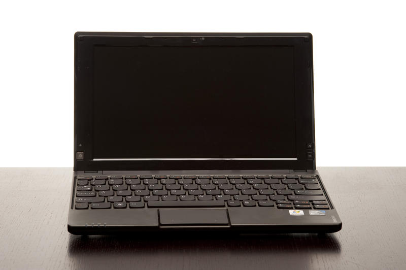an open netbook computer with a blank screen