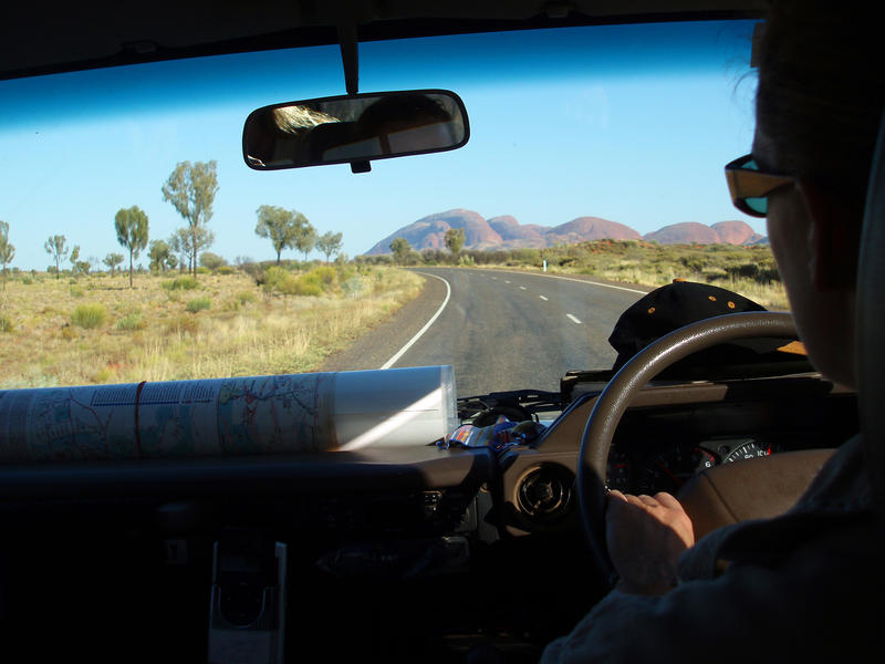 driving towards kata tjuta (the olgas) in australias red centre