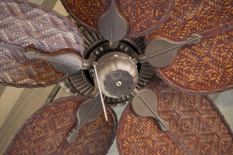 looking up at an old fashioned ceiling fan