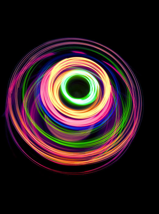 abstract pastel coloured pattern of glowing light circles