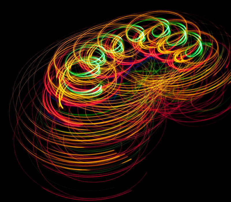 a slinky effect pattern of colourful light tracks