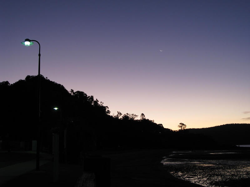 silhouette of a landscape under a twilight sky