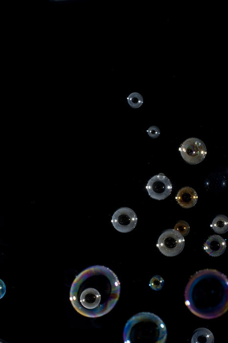 a background image with space for text featuring multiple soap bubbles