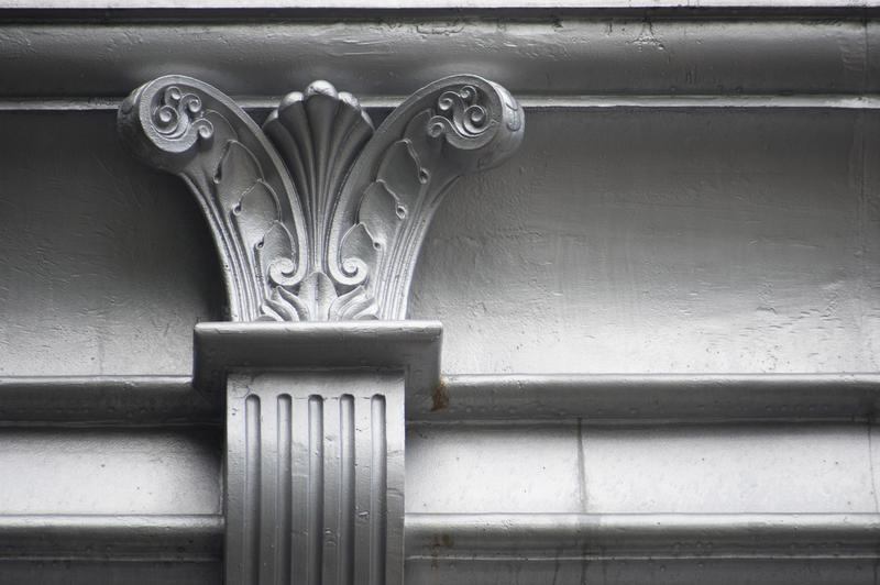 a cornice with floral design embellishment