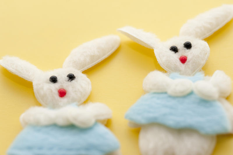 Two cute decorative needlework Easter Boy Bunnies in soft felt with blue clothing