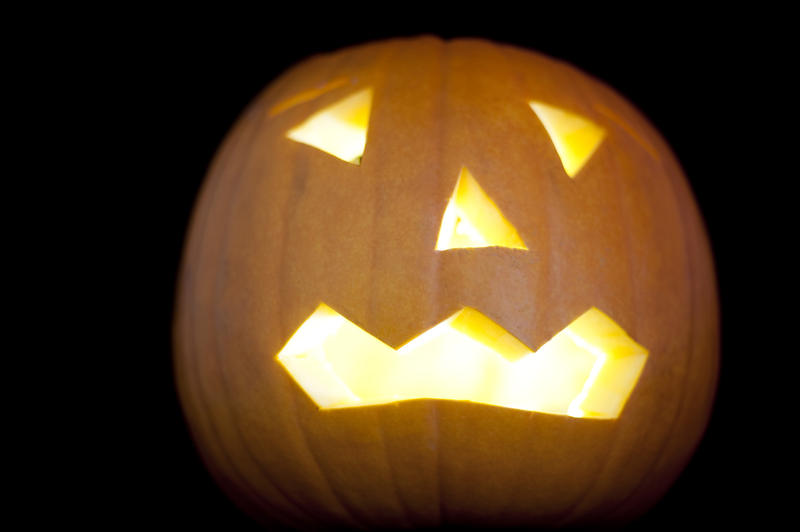 a spooky looking halloween pumpkin lantern
