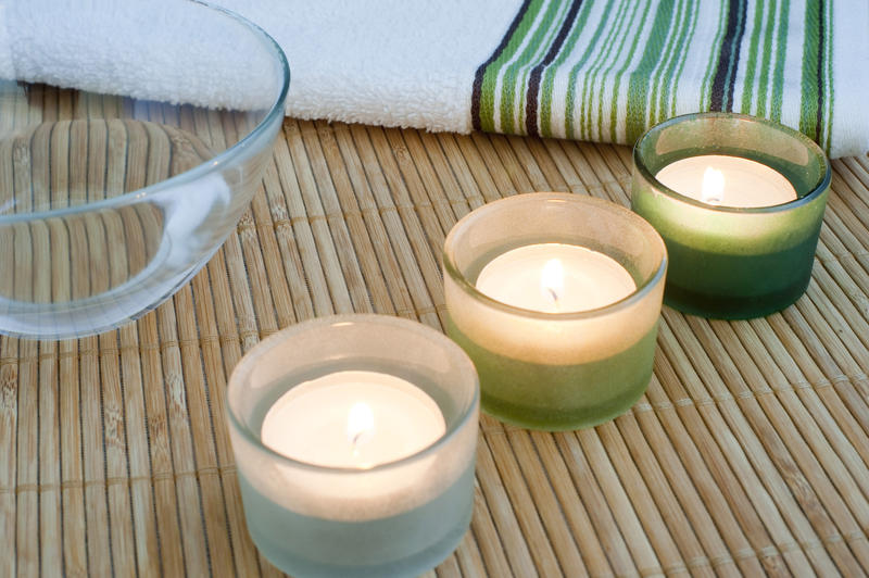scented aromatherapy candles and massage oil