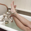 6887   Man enjoying a hot relaxing bath
