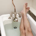 6928   Man relaxing having a bath