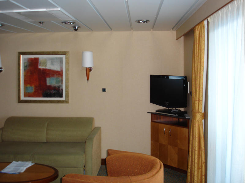 living room area in a cruise ship cabin