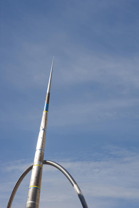 Detail of the metal and enamel pointed arrow column and the hoop of the Alliance sculpture, Cardiff, Wales