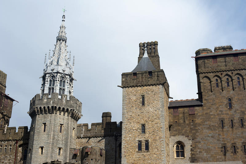Exterior facade and stonework of Cardiff Castle, Newport, Wales, with an ornate Gothic spire topping an octagonal tower