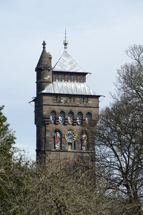 Cardiff Castle Clock Tower, Cardiff, Glamorgan, Wales designed by William Burges with a gilded clock on each face flanked by scultptures representing the planets