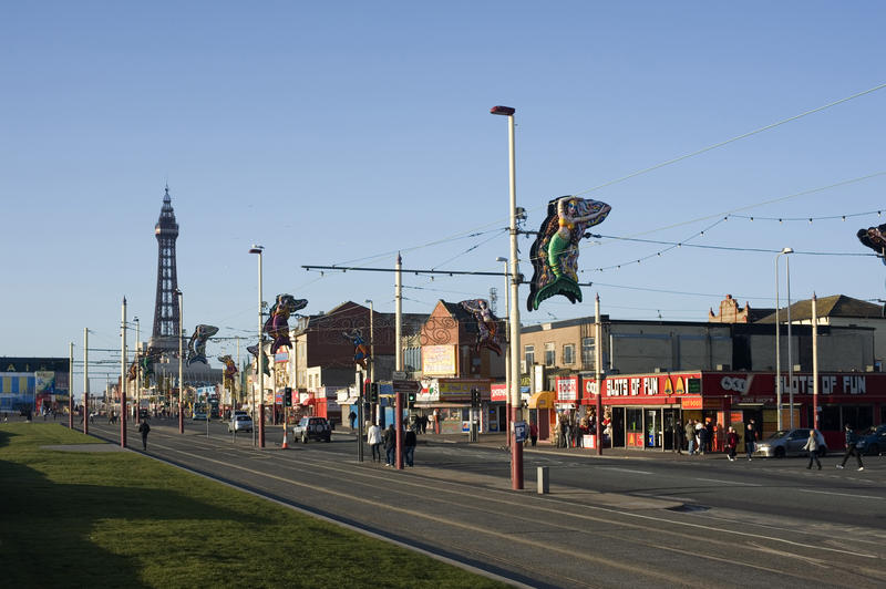 Blackpool street scene looking along the promenade towards the historical Blackpool Tower