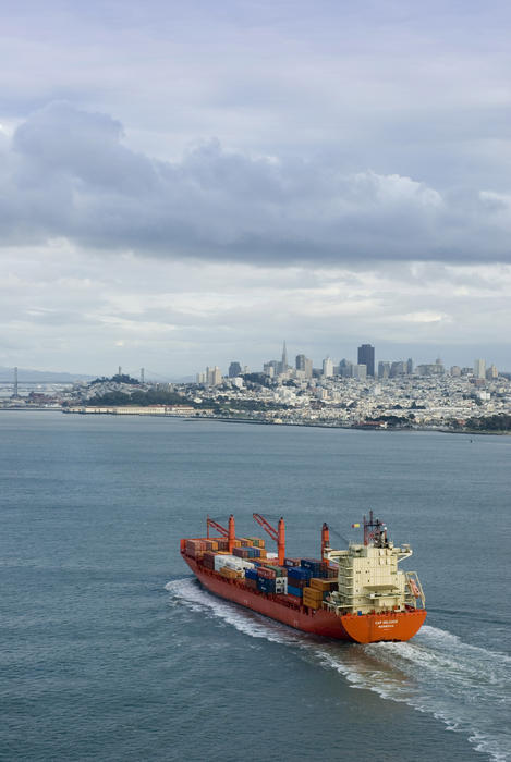 Loaded cargo ship transporting products into san francisco bay
