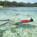 6299   Man snorkeling in clear blue water