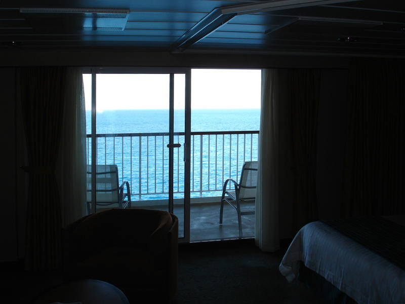 cruise ship cabin with a balcony
