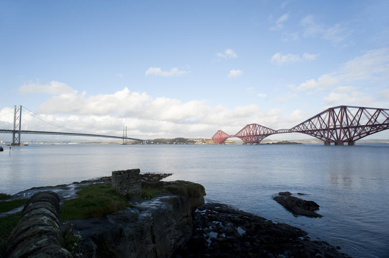 wide angle view of the two bridge crossings of the firth of forth, taken from the south side
