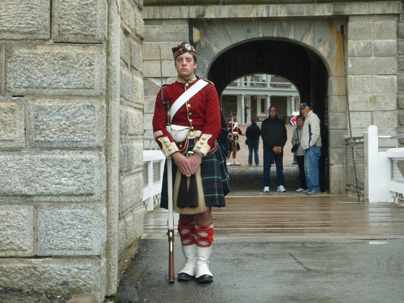 Halifax Citadel guard standing to attention as he guards the entrance in full regimental regalia