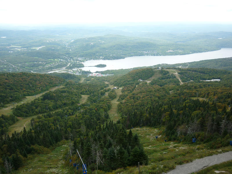 Aerial view over the Laurentian mountains of Lac Tremblant in Quebec, Canada with a small village and well known resort of Mont Tremblant at the south end