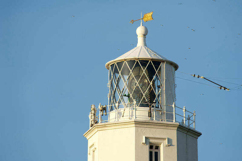 Closeup view of the lantern on top of the Lizard Lighthouse, Cornwall which warns shipping of the southernmost point of England