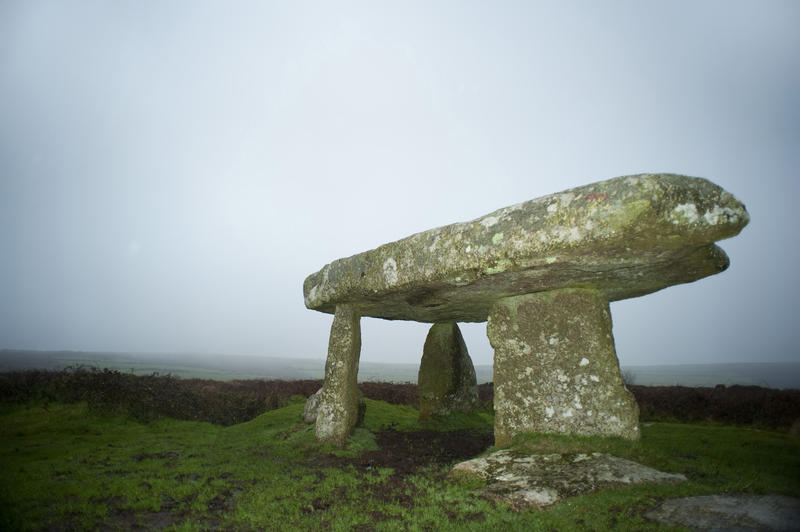 Lanyon quoit dolmen near Morvah, Cornwall with a huge granite capstone balanced on three uprights and thought to have been a prehistoric burial chamber or mausoleum