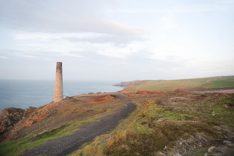 Mine chimney overlooking the Atlantic ocean, a remnant of an old Cornish tin mine near St Just, an area which now forms part of the the Cornwall and West Devon Mining Landscape World Heritage site