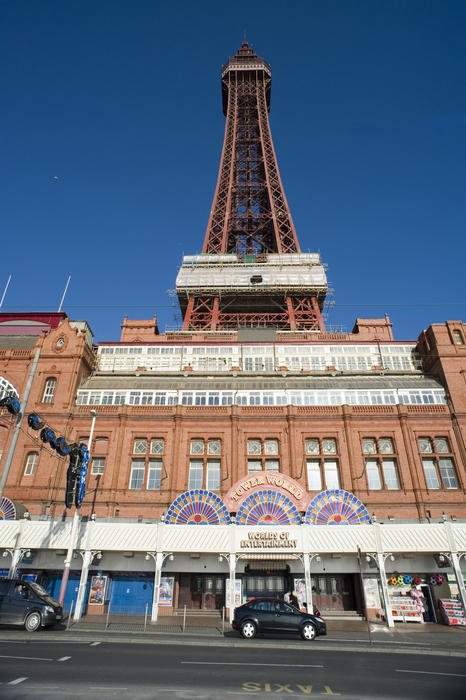 Blackpool waterfront with a low angle view from the promenade of the historical Blackpool Tower