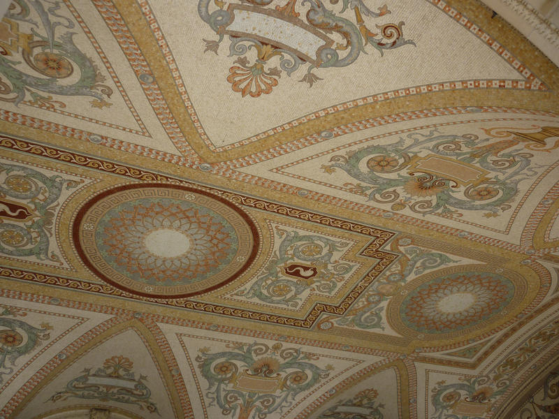 Architectural background of a beautiful inlaid mosaic ceiling with an ornate classical pattern