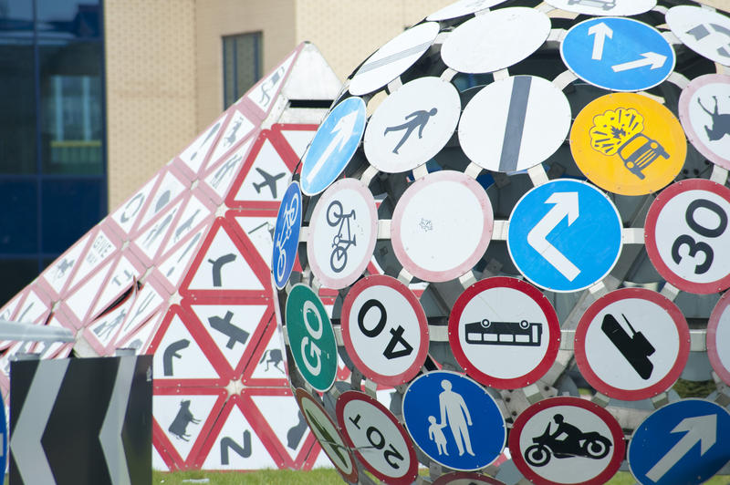 Detail of a roadsign sculpture by Pierre Vivant on The Landmark or Magic Roundabout in Splott, Cardiff