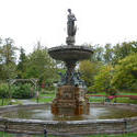 6779   Figural fountain in formal garden