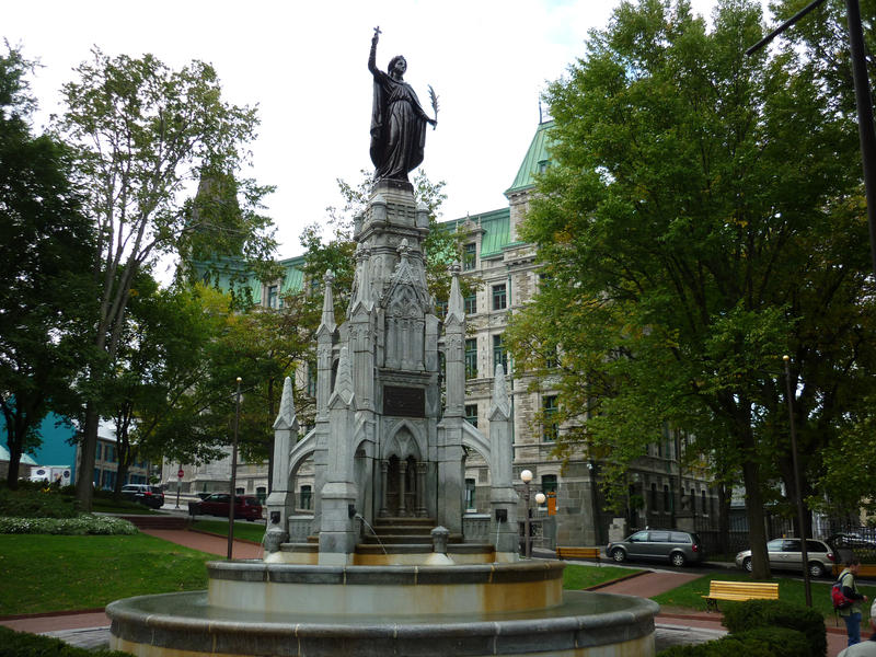 Place D'Armes Fountain with the Maisonneuve monument in Montreal, Canada