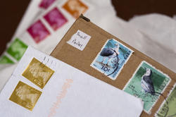 5367   UK postage stamps on mail