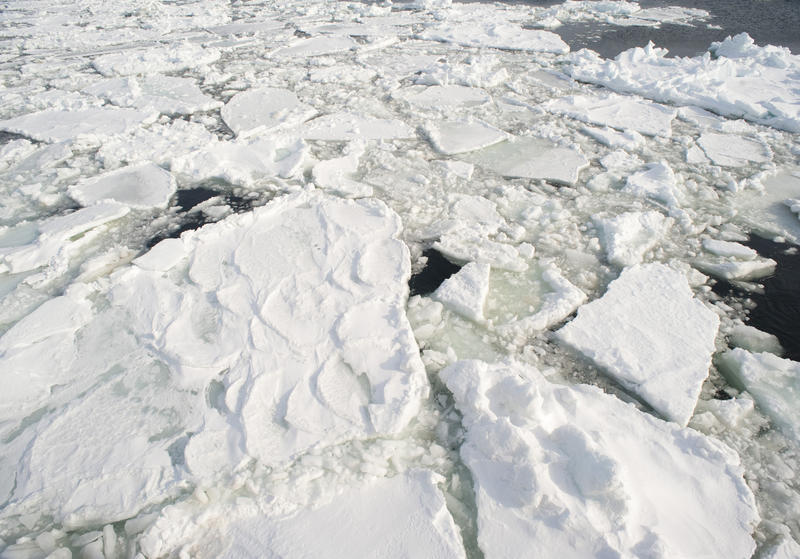 looking down onto broken drift ice sheets from an ice breaker ship