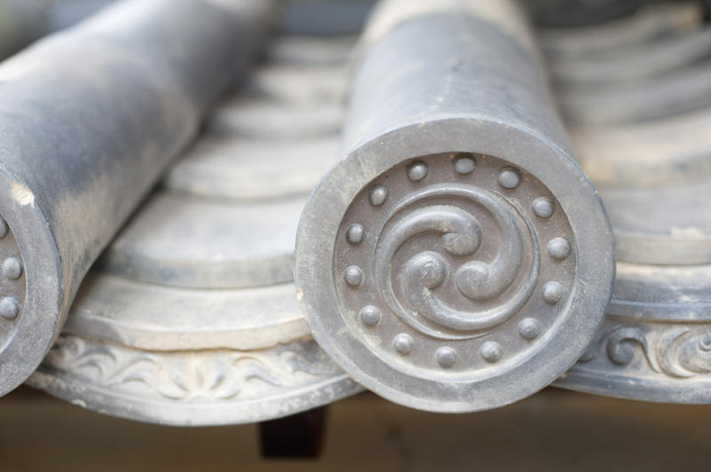 macro image of decorative roof tiles at the Daisen-in temple on the temple, kyoto, japan
